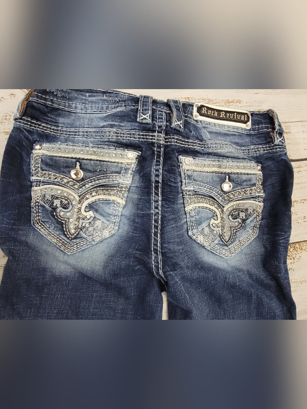 Rock Revival Women's Dark Blue Distressed Skinny Jeans with Embellished Pockets